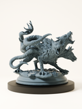 Figurine d’un molosse infernal à trois têtes avec tentacules, sur socle rocheux, pour jeu de rôle fantastique.