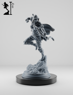 Figurine elfe ranger femme en pose dynamique avec arc long, capuche chainmail et manteau flottant pour jeu de rôle